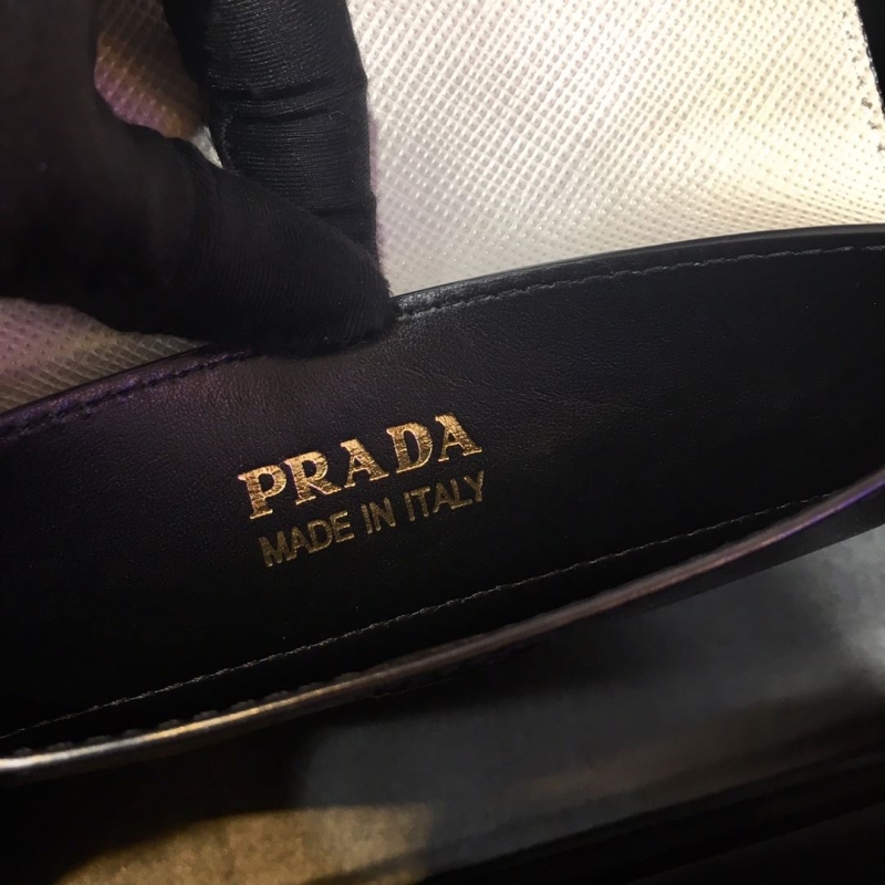 Pra*a top handle bags